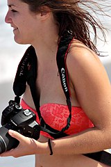 Bikini girl shooting the ocean